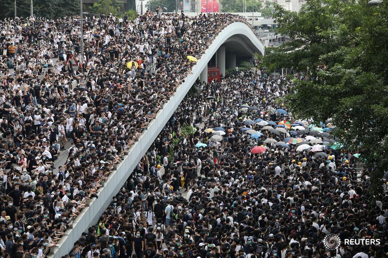 Reuters's tweet photo. EXPLAINER: Why proposed changes to Hong Kong's extradition law are fuelling protests https://t.co/12GAjPcTvc by @GregTorode For the latest on Hong Kong extradition bill protests, follow our live blog https://t.co/bMZwQe04bC https://t.co/m95cD5cMTW