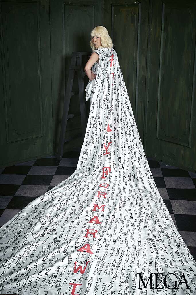 john herrera on X: This printed gown w/ an ultra long cape on