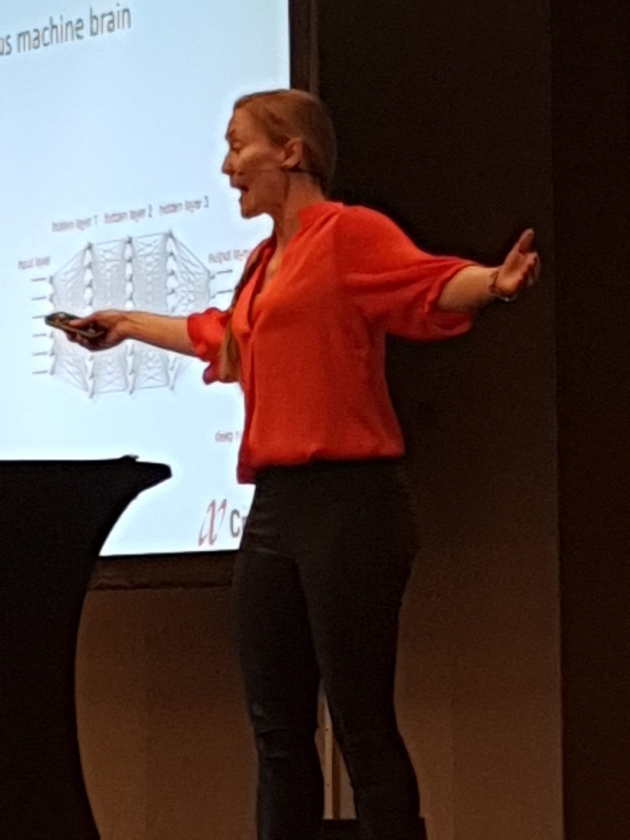 I’m a female speaker. Could somebody please design and develop wearable microphones that allow long earrings, that do no get tangled up in my long hair, and that do not require that I wear trousers with pockets to tuck away the battery and sender? Thank you!