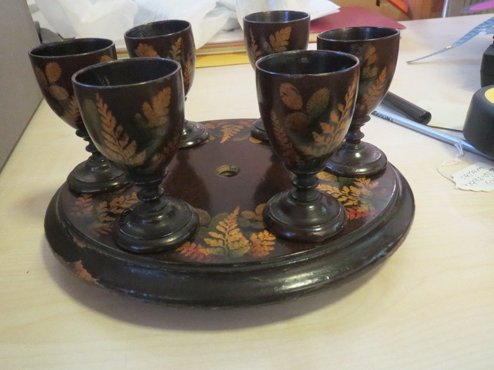NACHeritage's tweet photo. It's like Christmas come early here! We're busy opening boxes and unwrapping lots of lovely things while we do our collections inventory. Today, we liked this Mauchline #Fernware set of eggcups with their little tray, painted with pretty ferns. Who's for an #egg?
@audreynolan https://t.co/sZD3qzIVHw