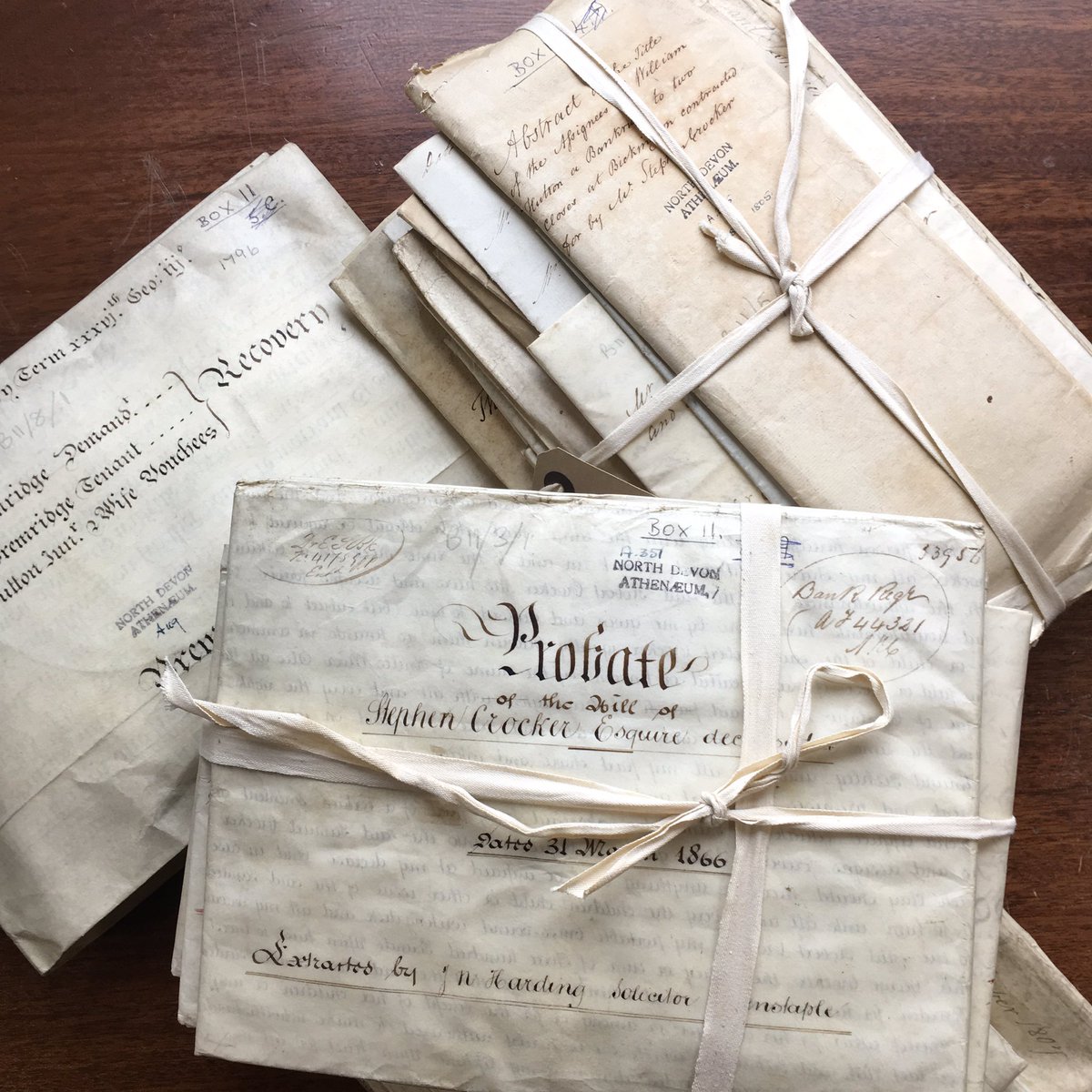 Barum_Athena's tweet photo. @ARAScot box for the day for #ArchiveBox us #box11 Ours contains deeds and titles for the Crocker family of Fremington. Looks like one of our previous Librarians was a little stamp happy with them though! #DocumentVandal #ExploreYourArchive #ArchiveBox https://t.co/Cm51HOMxVb