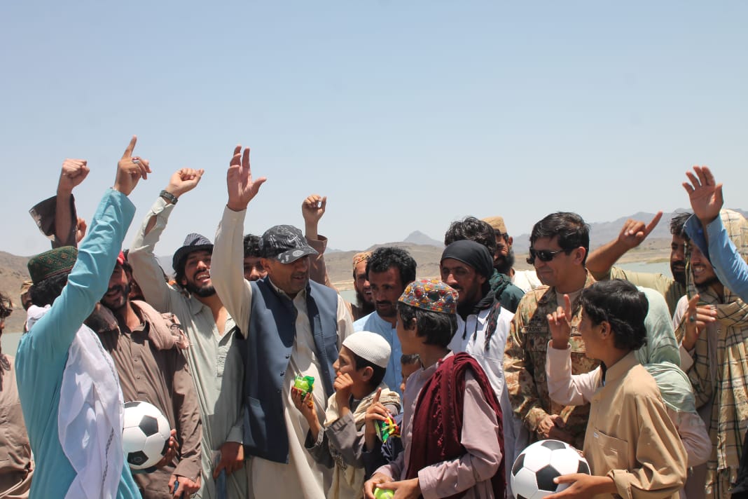 VofBalochistan's tweet photo. Sports is gaining immense popularity in #Balochistan. 
Sports items were distributed amongst the locals in #Dalbandin by #PakArmy. It is an amazing initiative to encourage and promote young athletes.
#Pakistan https://t.co/jkzhExdpzG