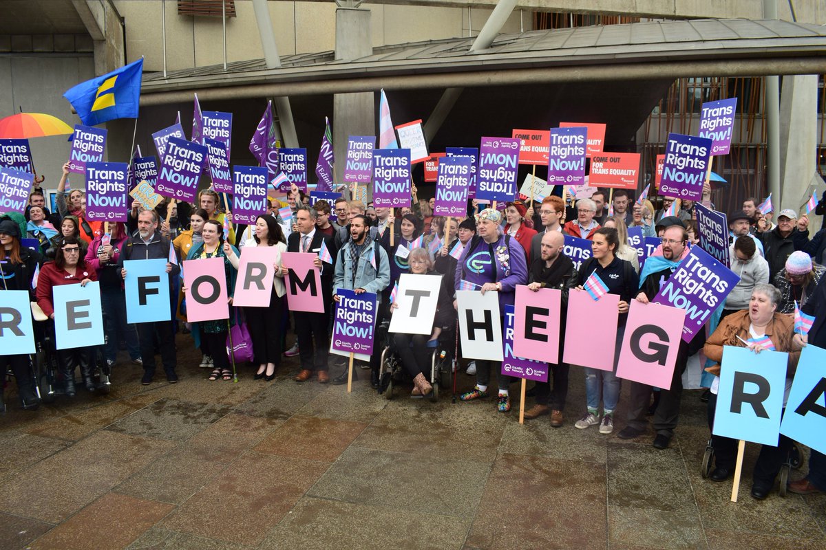 Ross_Greer's tweet photo. Powerful rally (in some powerful rain!) for trans rights today! #TransRightsAreHumanRights #EqualRecognition https://t.co/opgQcjKH7J