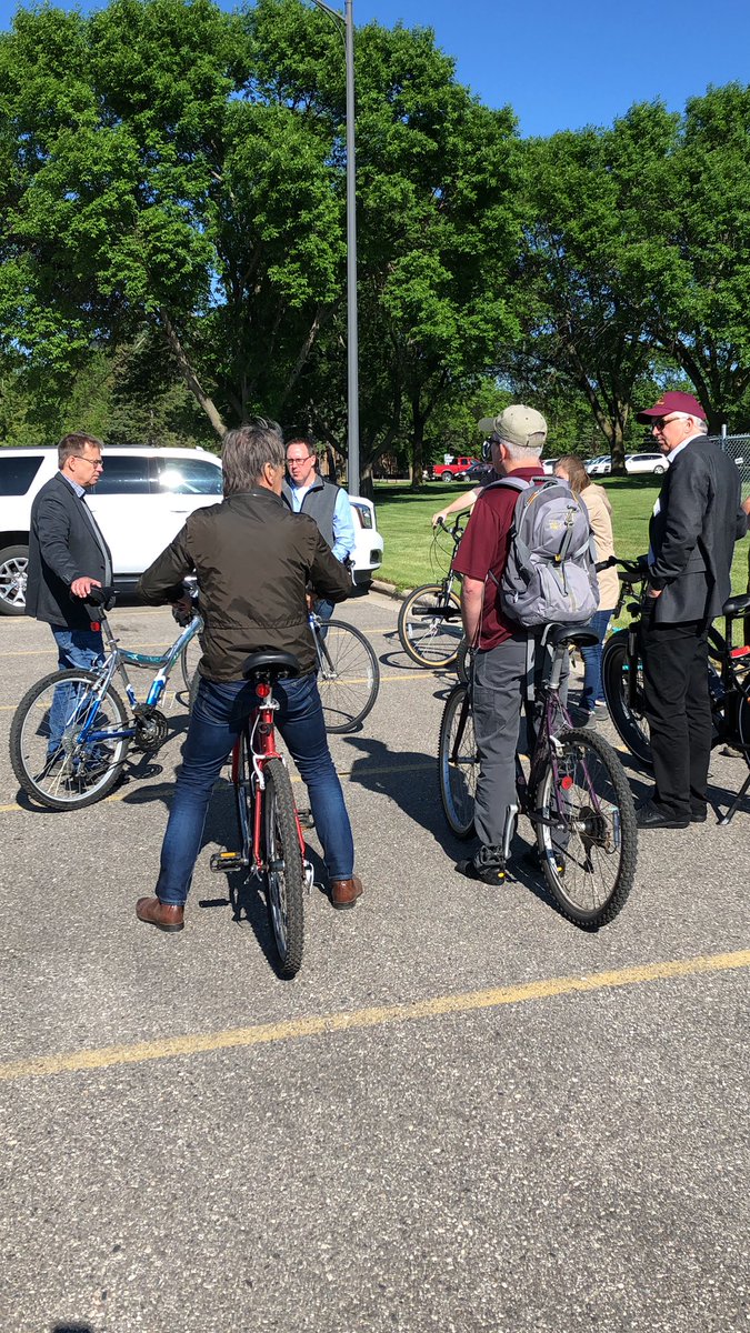 German visitors look at UMM solar array.