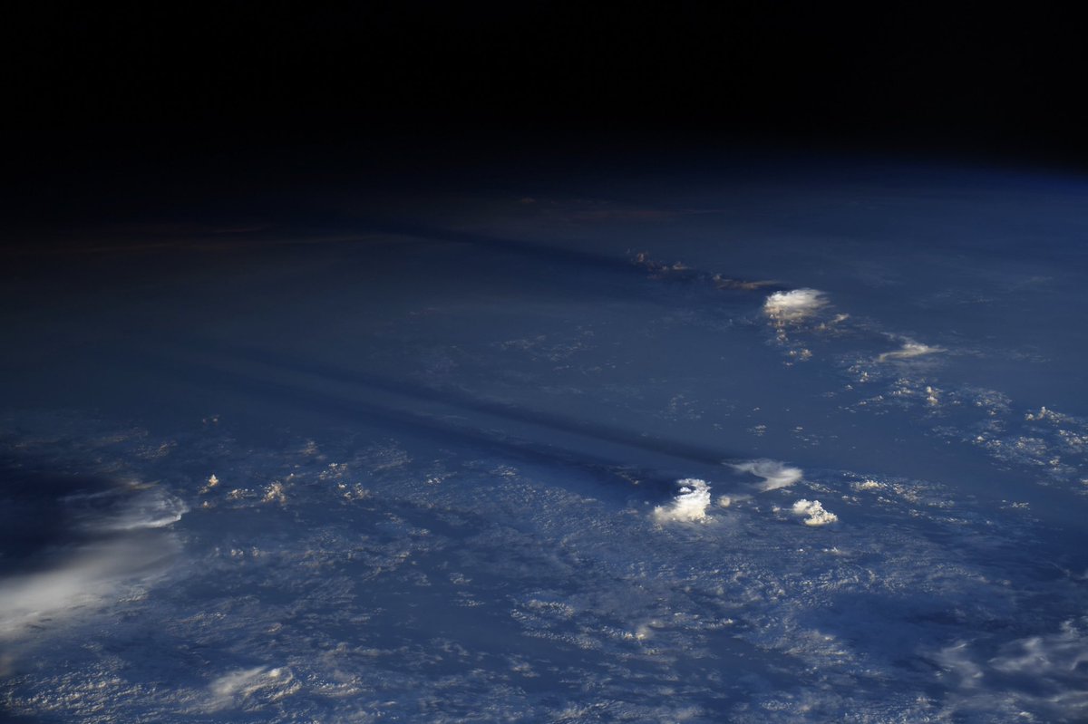 AstroAnnimal's tweet photo. Shadows from clouds at sunset go on for thousands of miles… https://t.co/JE0EckZNf9