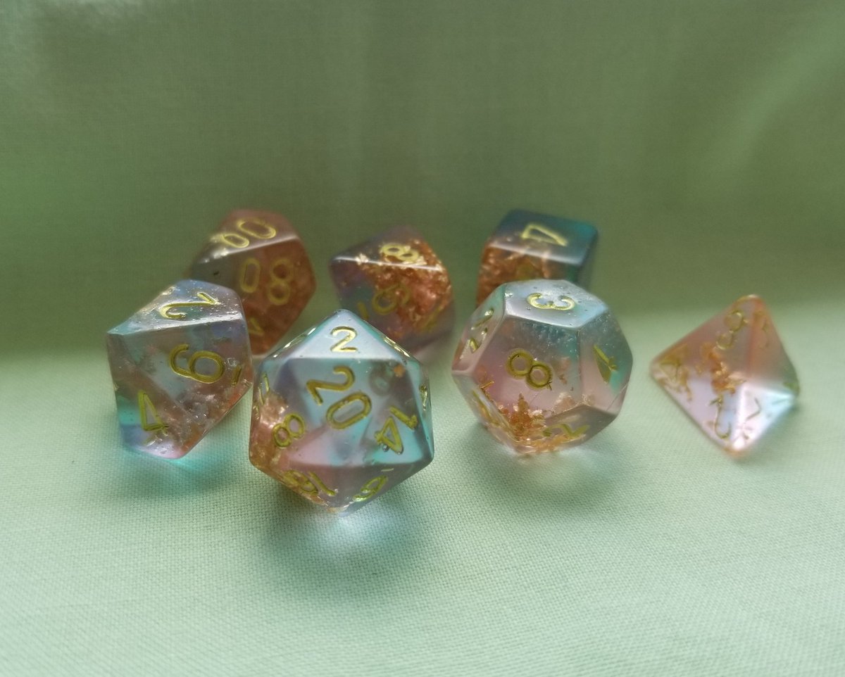 sandysaur's tweet photo. I got my dice from @CrowGlowing yesterday!  Feel lucky to have snagged them, I'm kind of obsessed with them tbh. https://t.co/cPtklXSpMw