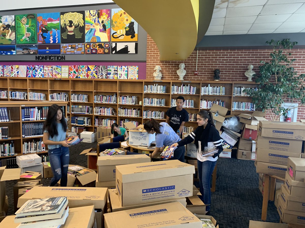 NHS kicking off the summer with the book bus! Glad none of the members got lost in the sea of books