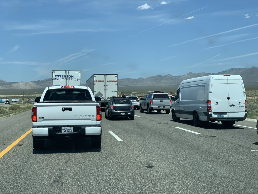 Elmer_Bol's tweet photo. Having fun in the middle of the a Mojave desert... Stuck in a traffic jam with @DrAaronMorris and @TomKurke .... it’s always great when construction is happening during the day.. https://t.co/LxCeVoBRPH