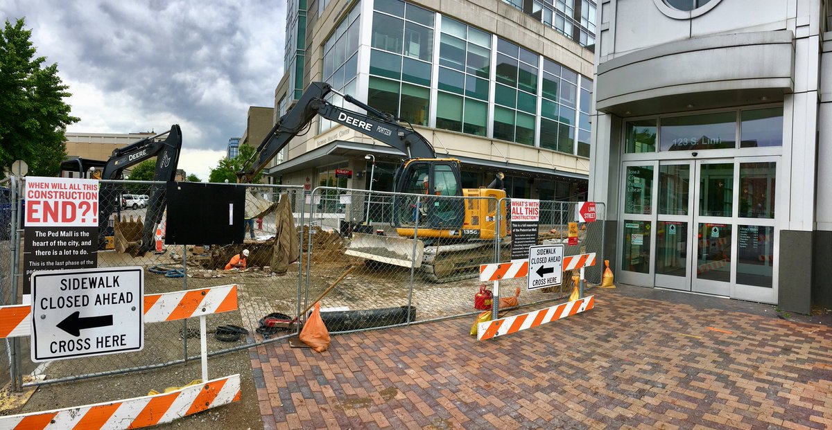 CityOfIowaCity's tweet photo. Water main replacement is underway in front of the @ICPL. The work is part of the Pedestrian Mall Improvements Project. Learn more: https://t.co/jatdwPsrQw 👷🏽♂️🚧👷🏼♀️ #pedproject #iowacity https://t.co/PKQ1YC8bq1