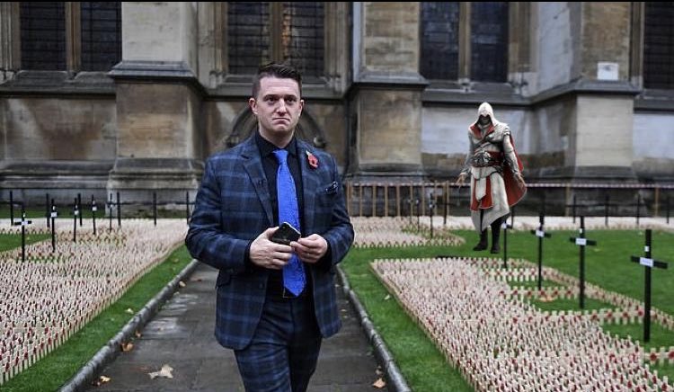 Ezio Auditore stalks Tommy Robinson before milkshaking him.‘Requiescat in lac Tommy’