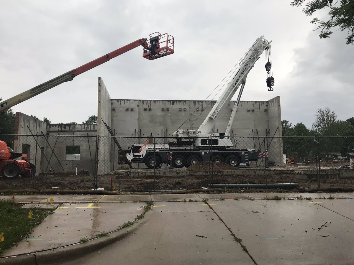 EngineeringShop's tweet photo. #precast walls going up at Dr. Howard. @Unit4Schools #crane #jlg #RainyDay https://t.co/VEp1vzVRcm