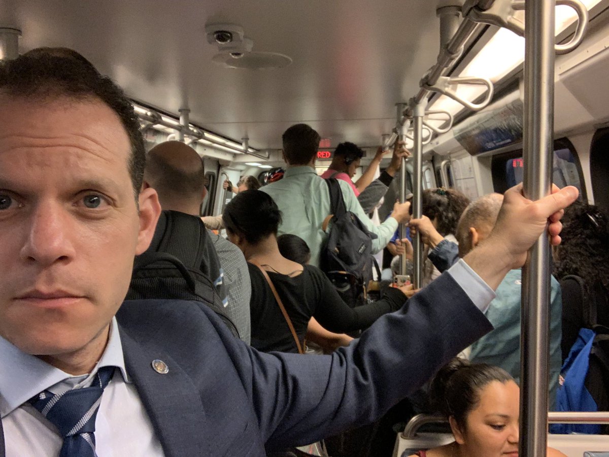 EvanMGlass's tweet image. Aboard a crowded Red Line train toward Glenmont. #transitchallenge