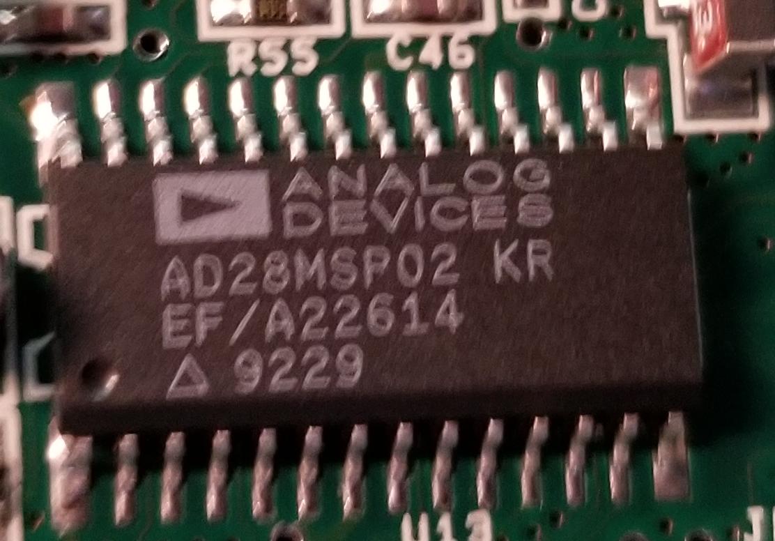 And another Analog Devices chip, an AD28MSP02 KR.This is a "Voiceband Signal Port", which is a fancy name for an analog-to-digital and digital-to-analog converter & codec & amplifier, designed for things like telephones.