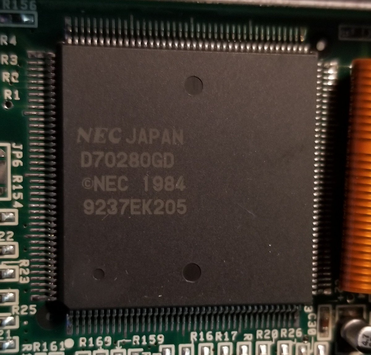 And this turns out to be the CPU! It's an NEC D70280GD. That's a V51 chip, which is a V30HL-based system-on-a-chip. So this is basically an Intel 8086 clone, with built in parallel port, DMA/DRAM controllers & keyboard controllers. It's a low power version, as you'd expect.