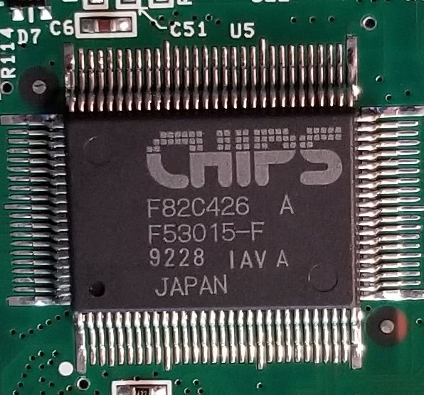 So let's figure out the chips, starting with... chips? This is a Chips and Technologies chip (Acquired by Intel in 1997), a F82C426, which is a CGA/LCD controller.