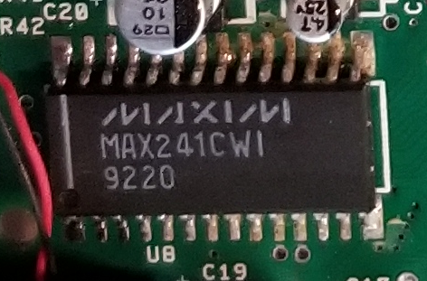 A Maxim MAX241CWI. This is a RS232 driver, as in it provides the weird voltages you need for RS232.