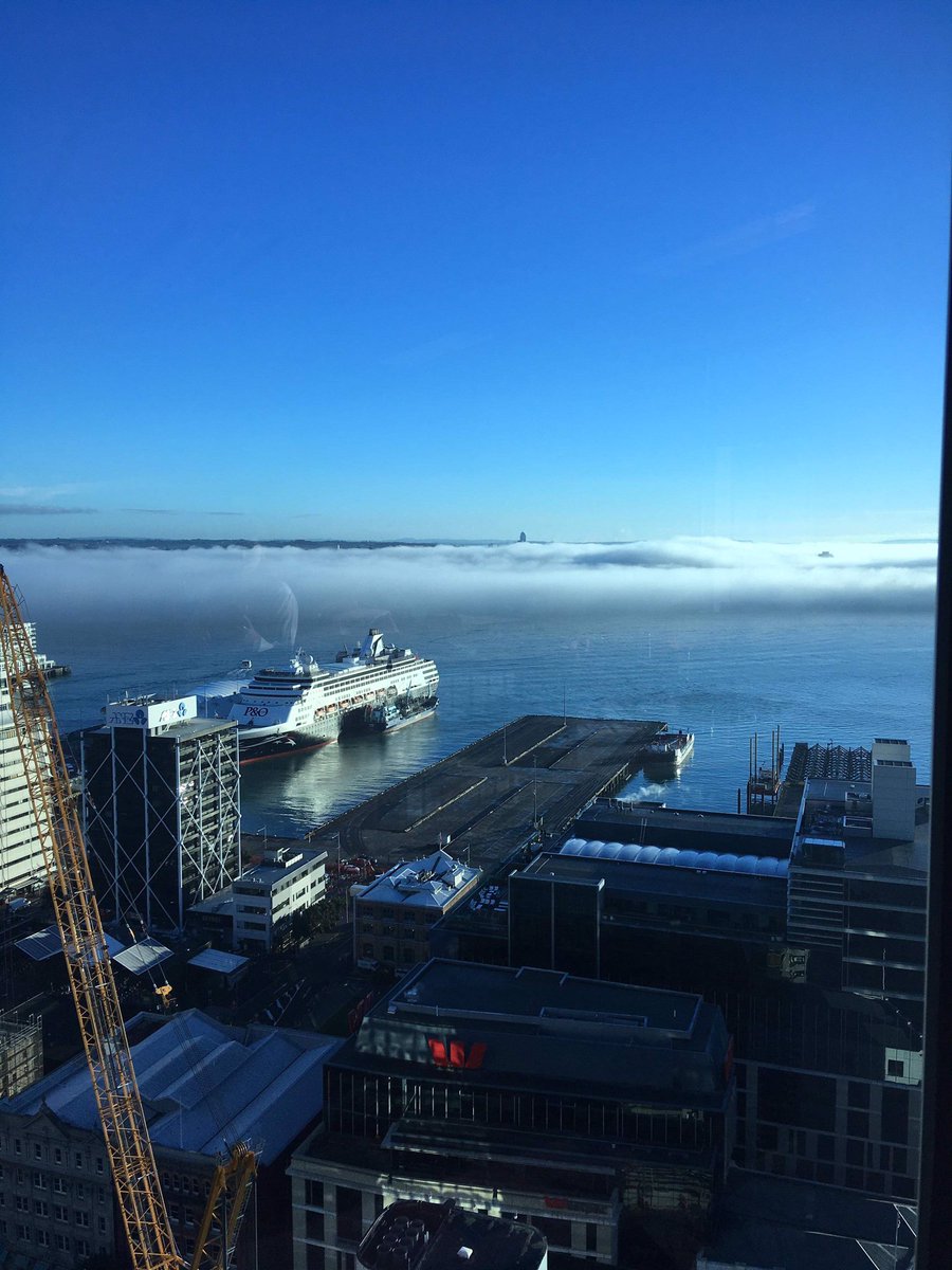 AucklandPort's tweet photo. Submission from a Fan - looking out over this mornings fog. We wish the sky had stayed this blue !! https://t.co/aPui0fHEQr