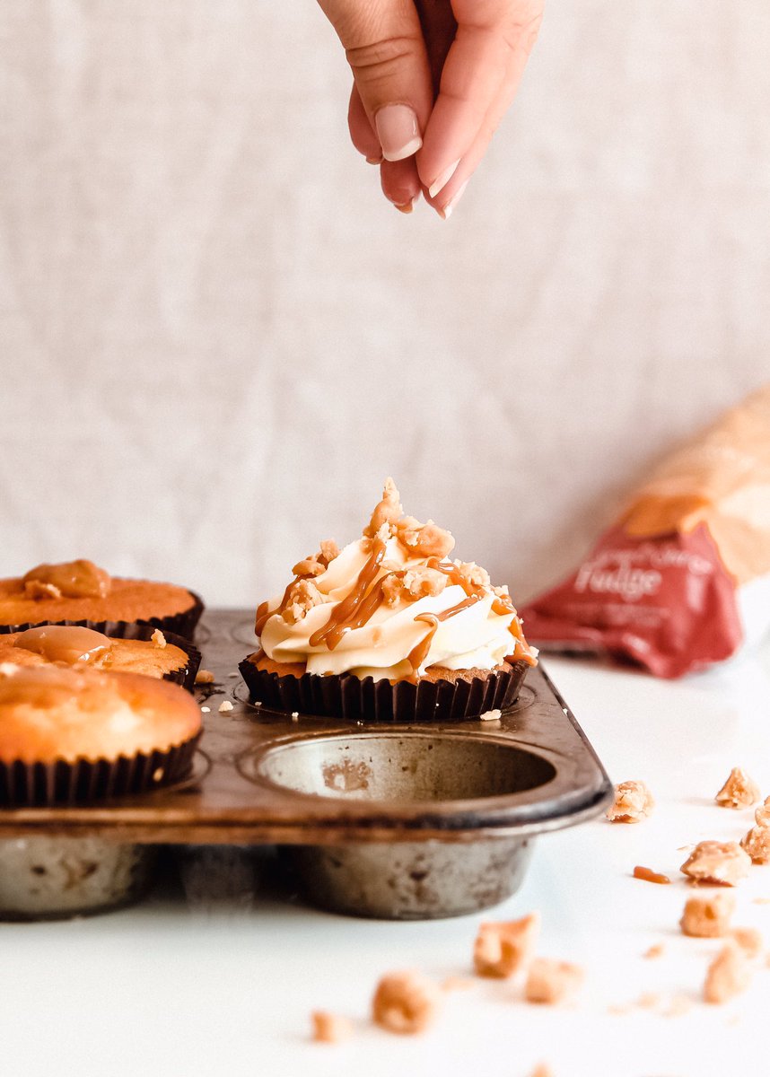 Finishing touches to our banoffee cupcakes... a drizzle of @UKCarnation caramel and a sprinkle of <a href="/CopperpotUK/">Copperpot Originals</a> maple syrup and sea salt fudge 😍 we’ve made these for <a href="/alzheimerssoc/">Alzheimer's Society</a> #CupcakeDay 
What will you be baking? #cupcakes #baking #sweet #delicious #caramel #fudge #banana