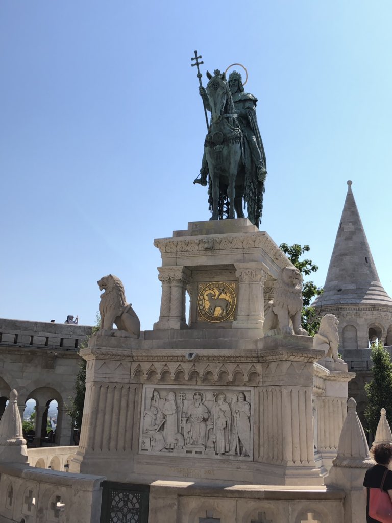 BoodyLit's tweet photo. Hermits Euro Tour 2019 starts the morning with local guide Marton on the Buda side of the Danube at Matthias Cathedral and the Fisherman’s Bastion overlooking the Pest side and a glorious view of Parliament #PestSide @SAThirdSemester https://t.co/VxBnPY0yxC