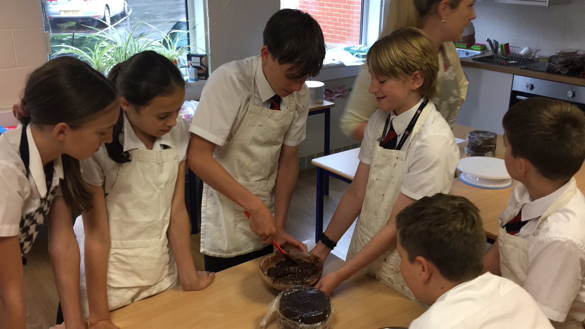 BGS_UpperSch's tweet photo. Today Year 8 are decorating cakes as part of their leavers programme. Here they making ganache. Can’t wait to see the final result #bgs_dt #bgs_sch https://t.co/K2dCkK5hZs