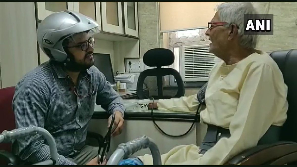 ANI's tweet photo. Delhi: Members of Resident Doctors' Association of All India Institute of Medical Sciences (AIIMS) work wearing helmets &amp; bandages, as a mark of protest against "worsening of violence against medical doctors in West Bengal." https://t.co/Fgrv6Jtjdq