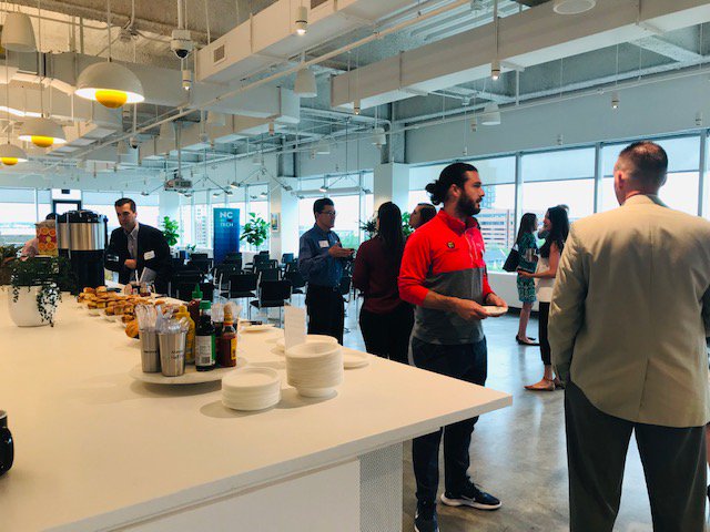 NCTA's tweet photo. Everyone (even Fido!) is welcome on the #NCTechTour! Here at @WeWork in downtown Raleigh for our Tech Talk Live on Military Workforce with speakers from @Fidelity @WGUNC @NCDIT @MetLife @ncmilitary and @DeutscheBank Next stop @avalara Full tour info at https://t.co/ZQe1Ksy2Ob https://t.co/s0I1AG7zLt