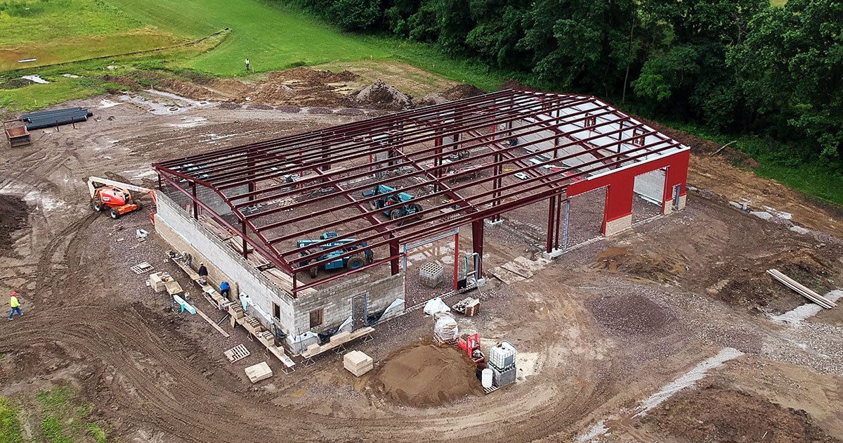 It is great to see the siding being installed on the exterior of the new bus garage on campus!