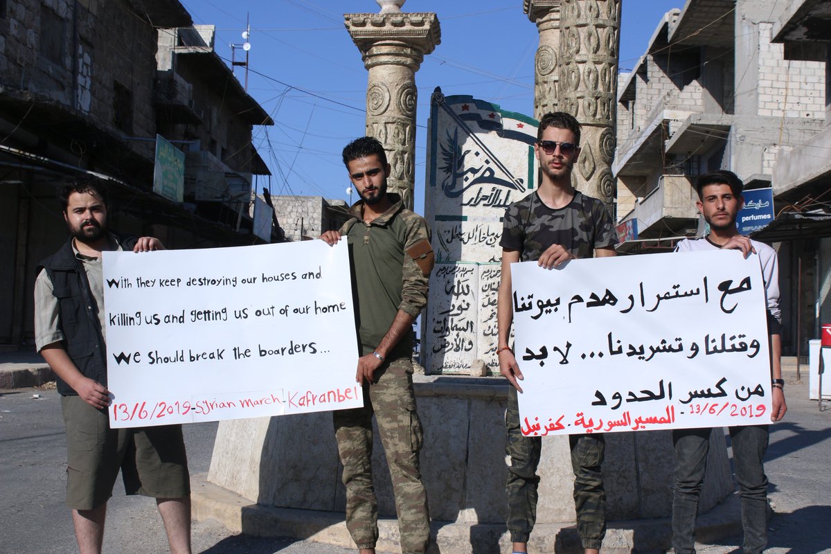 SyrianMarch's tweet photo. "With they keep destroying our houses and killing us and getting us out of our home. We should #breaktheborders." Kafranbel - 13/June/2019
#SyrianMarch - Follow @SyrianMarch
#SaveTheRest #Rise4Idlib #StopBombingIdlib #Syria https://t.co/uUQorQcWUx
