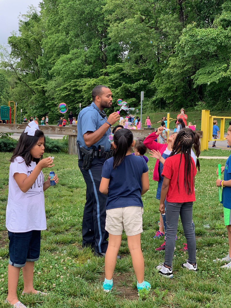 AACOPD's tweet photo. PFC Wood and Officer Ford stopped by Rolling Knolls Elementary School this morning to participate in the end of school year fun! @AACountySchools https://t.co/kDHrUoarWP