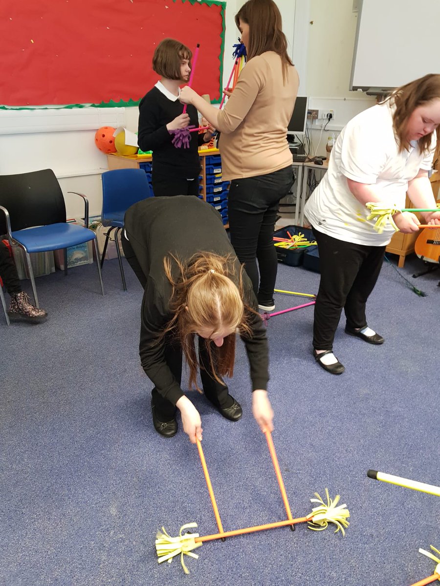 ASNRossHigh's tweet photo. It was too wet for the big top outside but we brought the circus indoors today. Orange class getting to grips with some of the tricks they were taught in circus workshops #TheGreatestShowman #thematicproject #HWB https://t.co/M9421tiZ1s