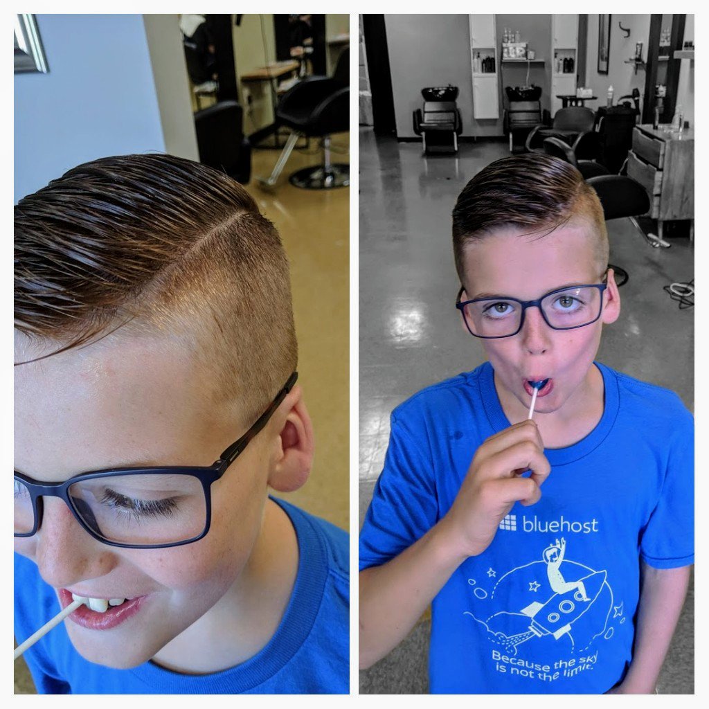 Fresh cut? Check.

<a href="/bluehost/">Bluehost</a> Swag from #WCRaleigh? Check.

Sucker because he's still not too cool to be a kid? Check.

My middle boy.