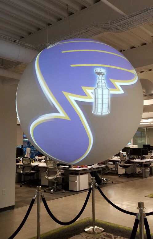 SamEathington's tweet photo. Perks of working from the St. Louis office today - @climatecorp globe takeover. #stlproud #stlouisblues #BleedBlue #climatelife #StanleyCupChampions2019 @FieldView @StLouisBlues https://t.co/6NcDO9MUlN