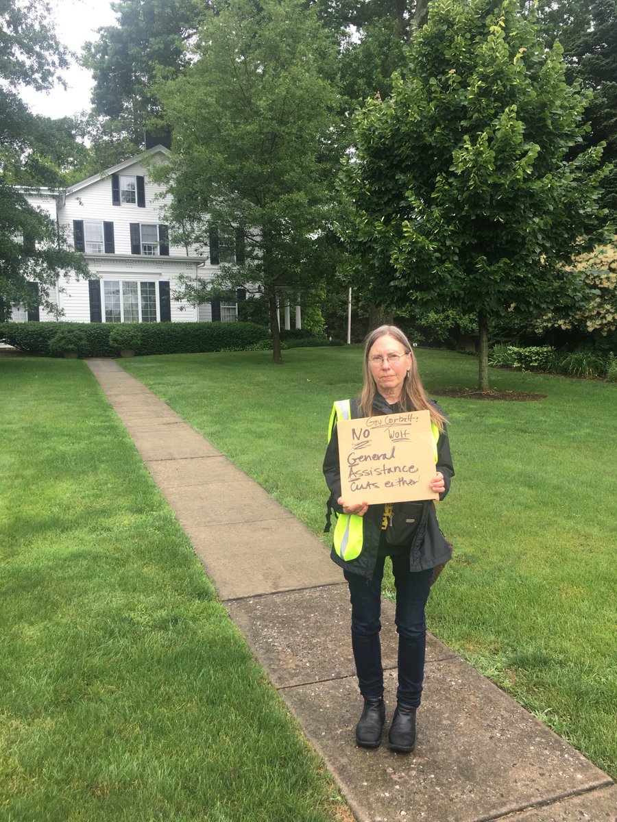 PennsylvaniaPPC's tweet photo. @changeseeker2 - Pat Albright, a single mother, benefited from #GeneralAssitance after she was laid-off & can testify to what a lifeline GA is. She's holding a sign from 2012 when former Gov. Corbett eliminated GA. @GovernorTomWolf: Keep your promises - #DefendGA. https://t.co/nQKfkxMrVO