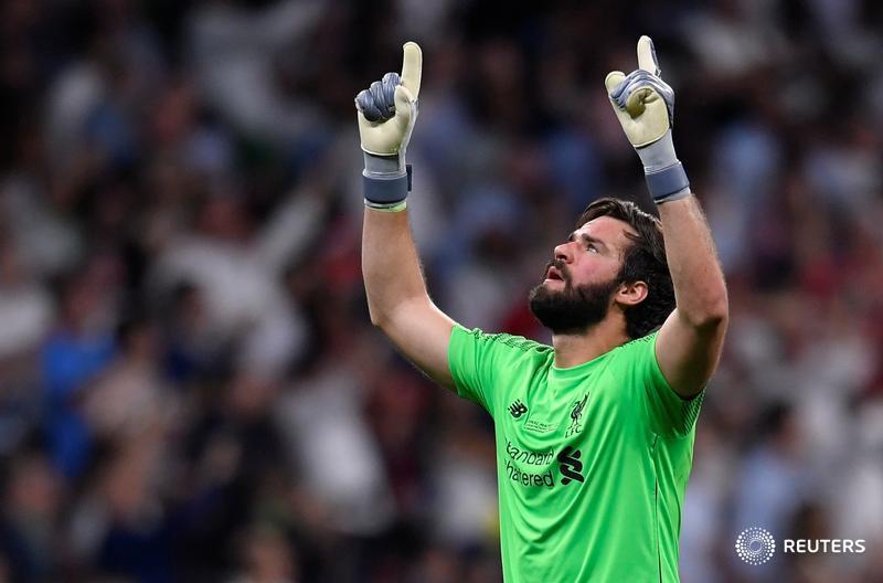 Reuters's tweet photo. Salah and Origi strike to give Liverpool Champions League triumph https://t.co/O6c7l1LaLu #UCLfinal https://t.co/OGRhfPjPP6