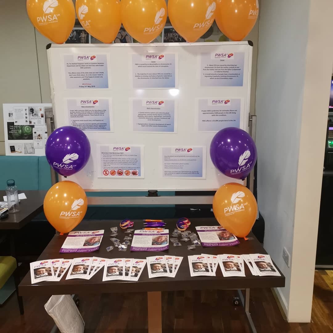 andrew_fergie85's tweet photo. Wee awareness stand in my work. Great support from the team and raising awareness for Prader-Willi syndrome. #GoOrangeForPWS @PWSAUK @jlandpartners #wearepartners https://t.co/HWbMrJHyJo