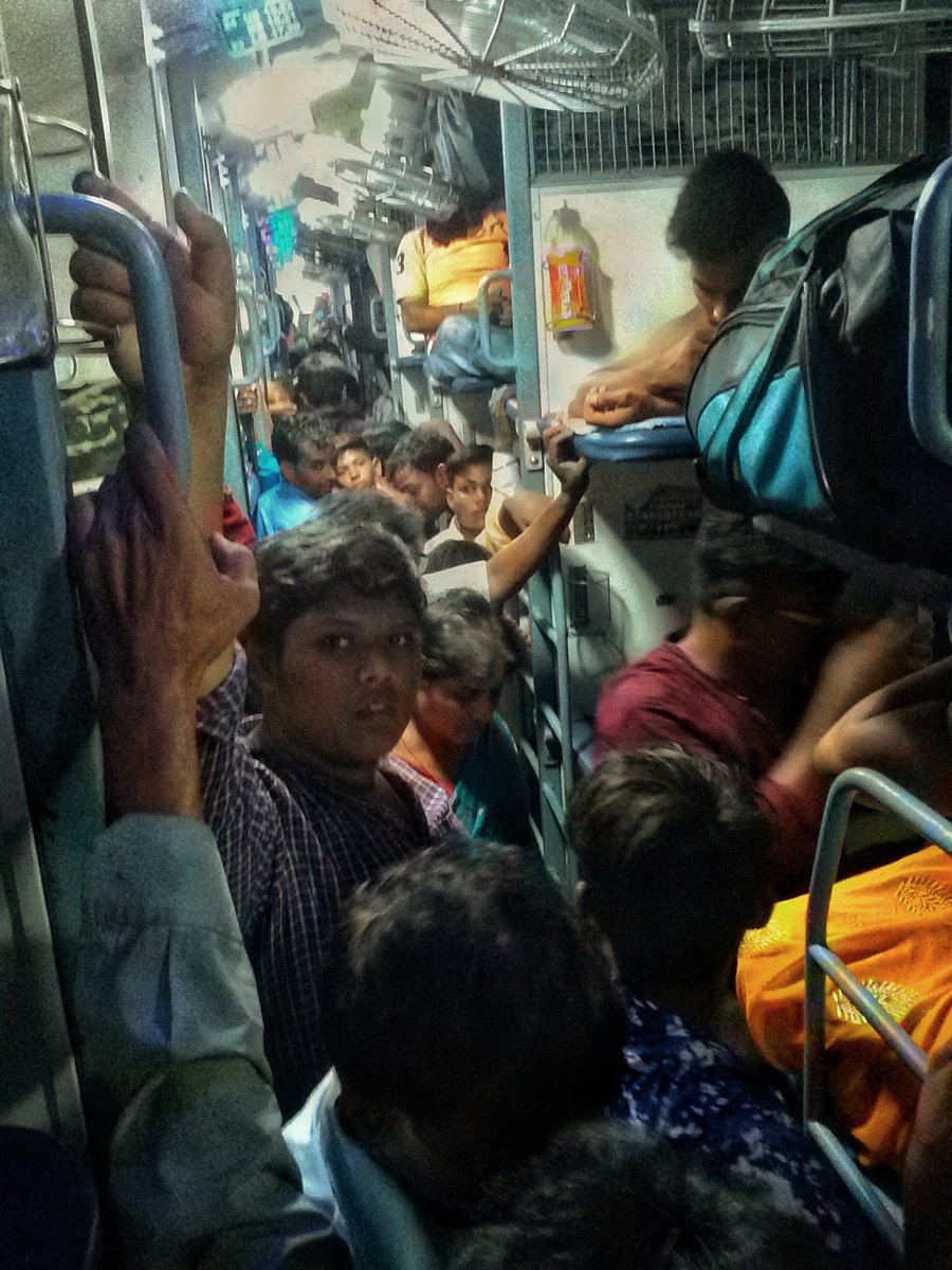 vivekobray164's tweet photo. What is the basic difference between sleeper coaches and General coaches? 
#12296-SanghmitraSFexpress
Sleeper coaches are now became the stretchable fix bag pack in which any nos. of passengers are going to push into it.
Please consider our miserable condition in sleepers coach. https://t.co/3ziBaN9mW8