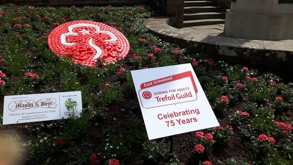 The #EastGrinstead High Street flower beds new display includes the <a href="/TrefoilGuild/">Trefoil Guild UK</a> display celebrating 75 years. Trefoil Guild is #Guiding for Adults. Alongside their own activities they often help our with local Guiding events. Thank you this #VolunteersWeek2019