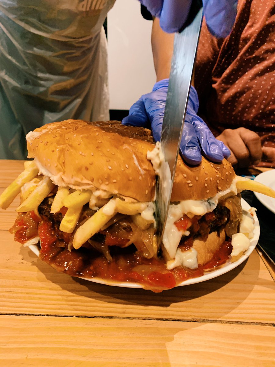 At <a href="/SaGrillfather/">The Grillfather SA</a> in Mitchells Plein and they’re feeding us a 2,8kg burger. WTF 😳