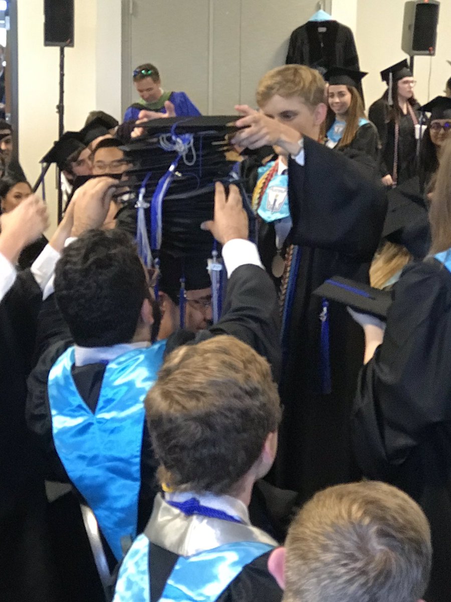 CurtisHosek's tweet image. That’s a 24 story motarboard. Well played class of 2019.