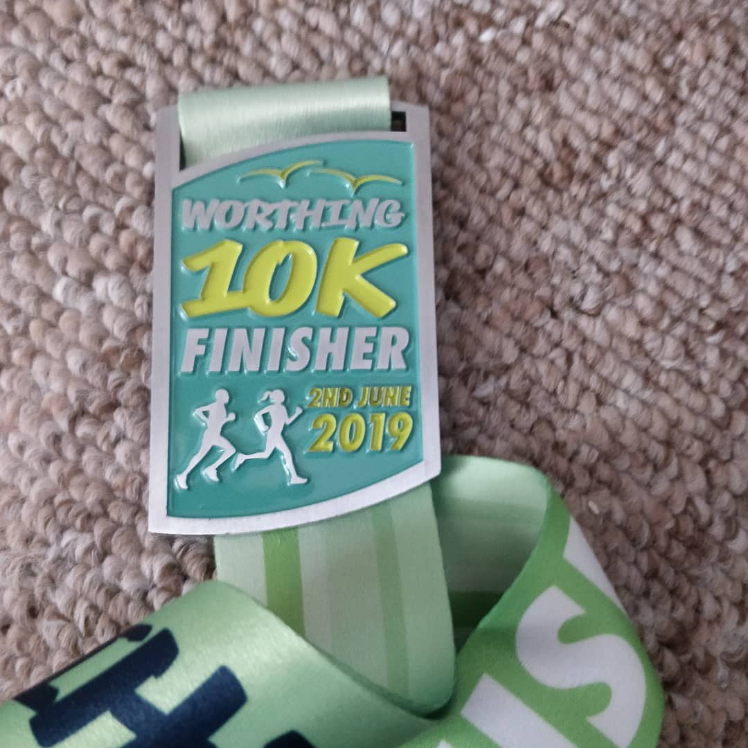 10km run number 1 done. Ouch that was warm. No matter the time every one gets the same medal. Such great atmosphere and support. #worthing10k