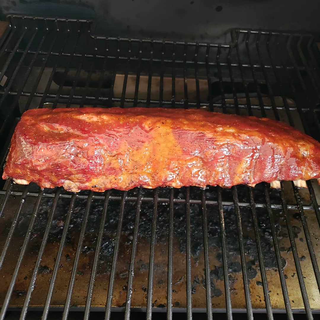Here is a picture of the ribs we worked on Thursday. Rubbed with <a href="/MeatChurch/">Meat Church ™</a> Honey bacon hog rub the night before. Finished with <a href="/UBsauce/">Uncle Bob's Sauce</a> Original cooked on a <a href="/TraegerGrills/">Traeger Grills</a> Ironwood. Looking forward to perfecting the craft!