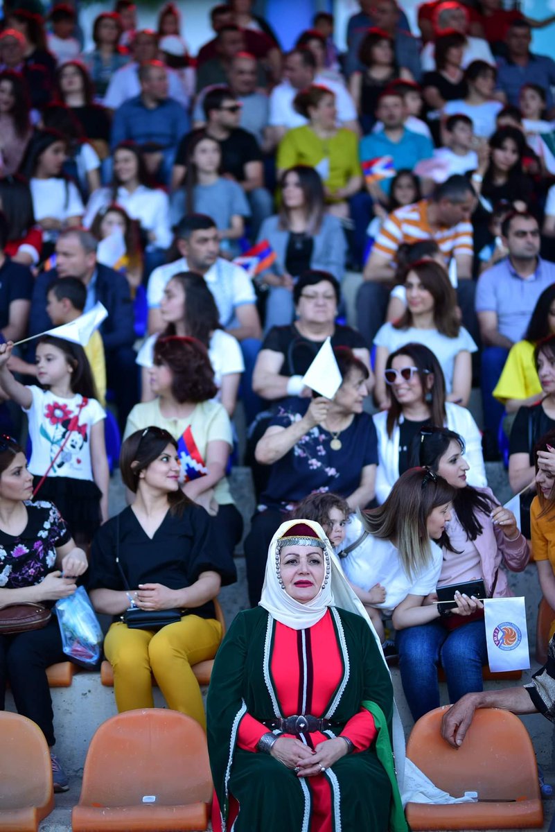 ANZHELA_YAN's tweet photo. #Stepanakert, the capital city of #Artsakh, was alive with activity, the way to the stadium packed with families, officials, soldiers and visitors, and the grass verges overlooking the stadium thronging with #Artsakhians eager to take part in the ceremony of #CONIFA #CONIFA2019🇦🇲 https://t.co/xAFDknae52