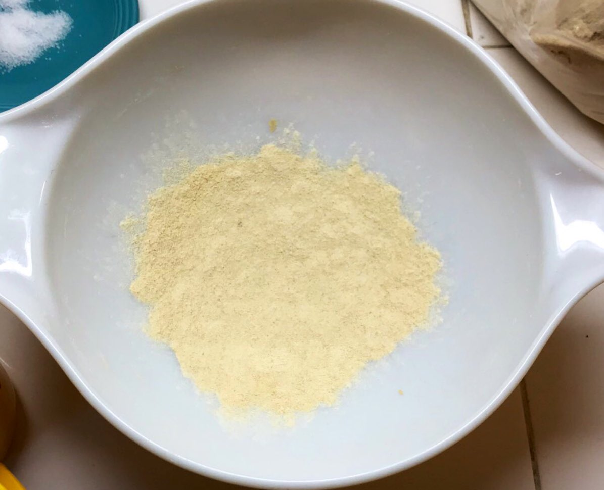 Pick up your dough ball, and put it upside down (oily side up) into the big bowl with the dusting of flour on the bottom. Make some dents in the top with your fingers. These will help hold the salt.