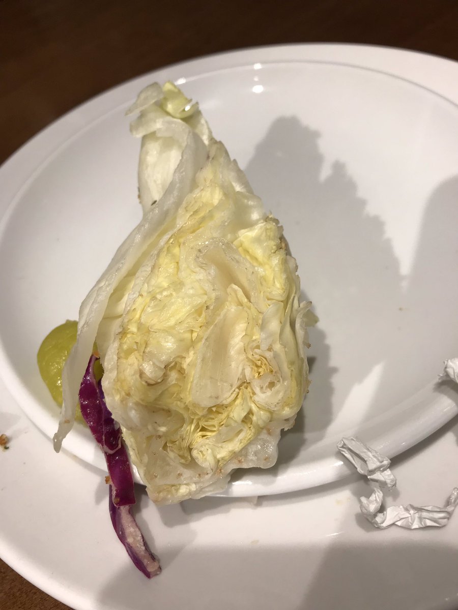 BrewCrewDrew's tweet photo. @olivegarden I did not but now after being seated 55 minutes later I’m considering it after finding this in the cabbage filled salad... https://t.co/qMuBH1eaaM