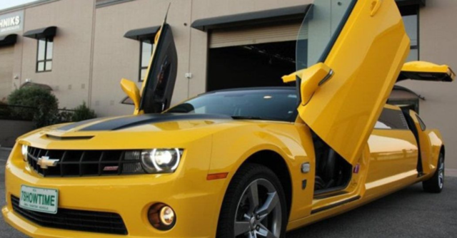 sullivanlimos's tweet photo. You all remember Bumblebee from Transformers? In Australia, they decided to make that type of Camaro into a limo. Just for good measure, they also added gull wing AND scissor doors: https://t.co/CAvzoLatR6 #transformers #limousine #camaro #limo https://t.co/t2v9K7IfVL
