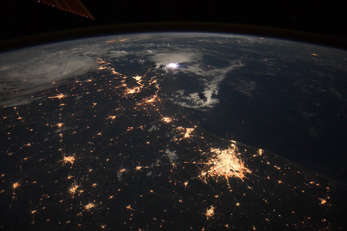 astro_ricky's tweet photo. The Gulf Coast looking eastward from #Houston towards a lone flash of lightning illuminating the #Mississippi Delta just downstream from #NewOrleans. https://t.co/Lj3GSquOe9