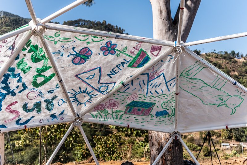HelloWorld_Org's tweet photo. What happens when it rains? Won't all the hub tech get ruined? Not with the Hello Dome!! It's windproof and lightweight.. and the best bit: communities can decorate their domes so that they truly become theirs. #projecthelloworld #communityengagement #educationforall https://t.co/wfh8a121Ar