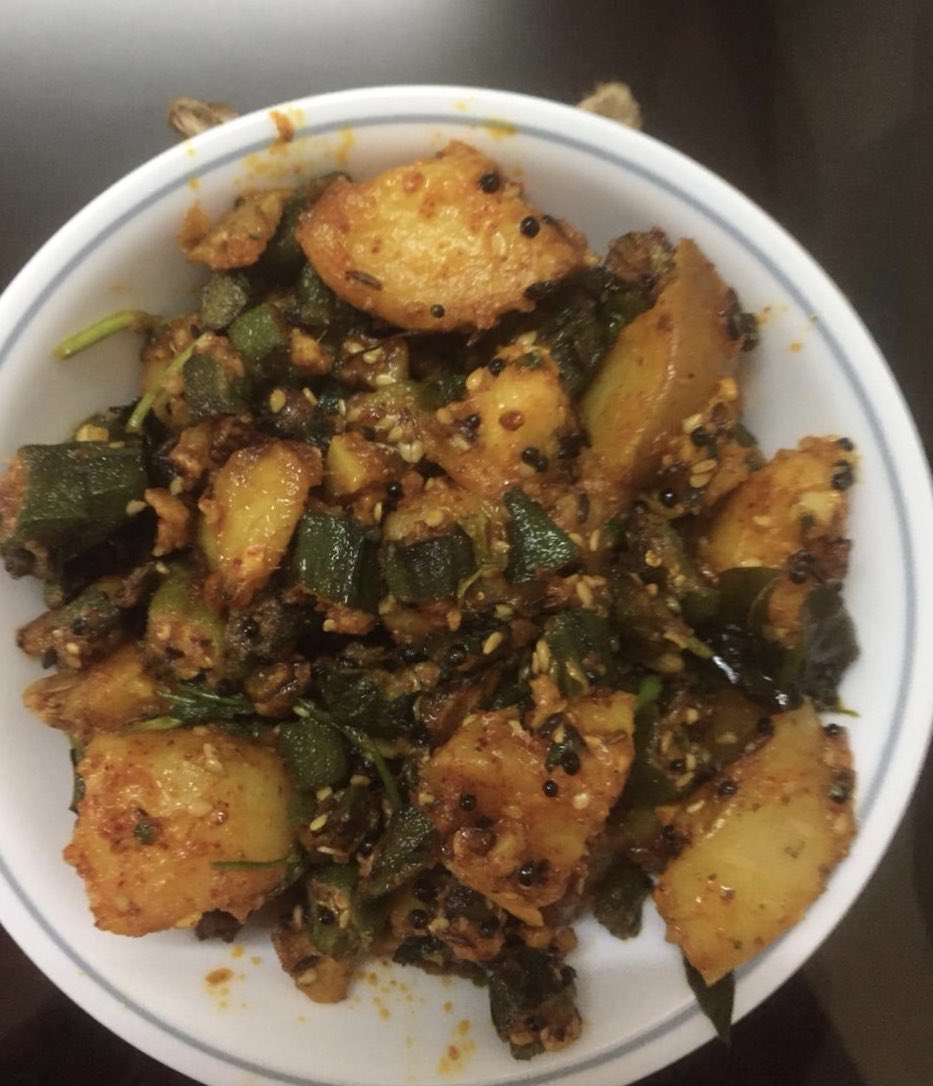 Heat oil, add mustard seeds once they crackle add cumin, garlic, when it changes colour like finch
Put asafoetida, potatoes, okra, salt a good pinch
Cover with lid for 5 mins, add chilli powder, coriander, chopped ginger 1 inch
Add lemon juice, this recipe is a cinch

#AlooBhindi