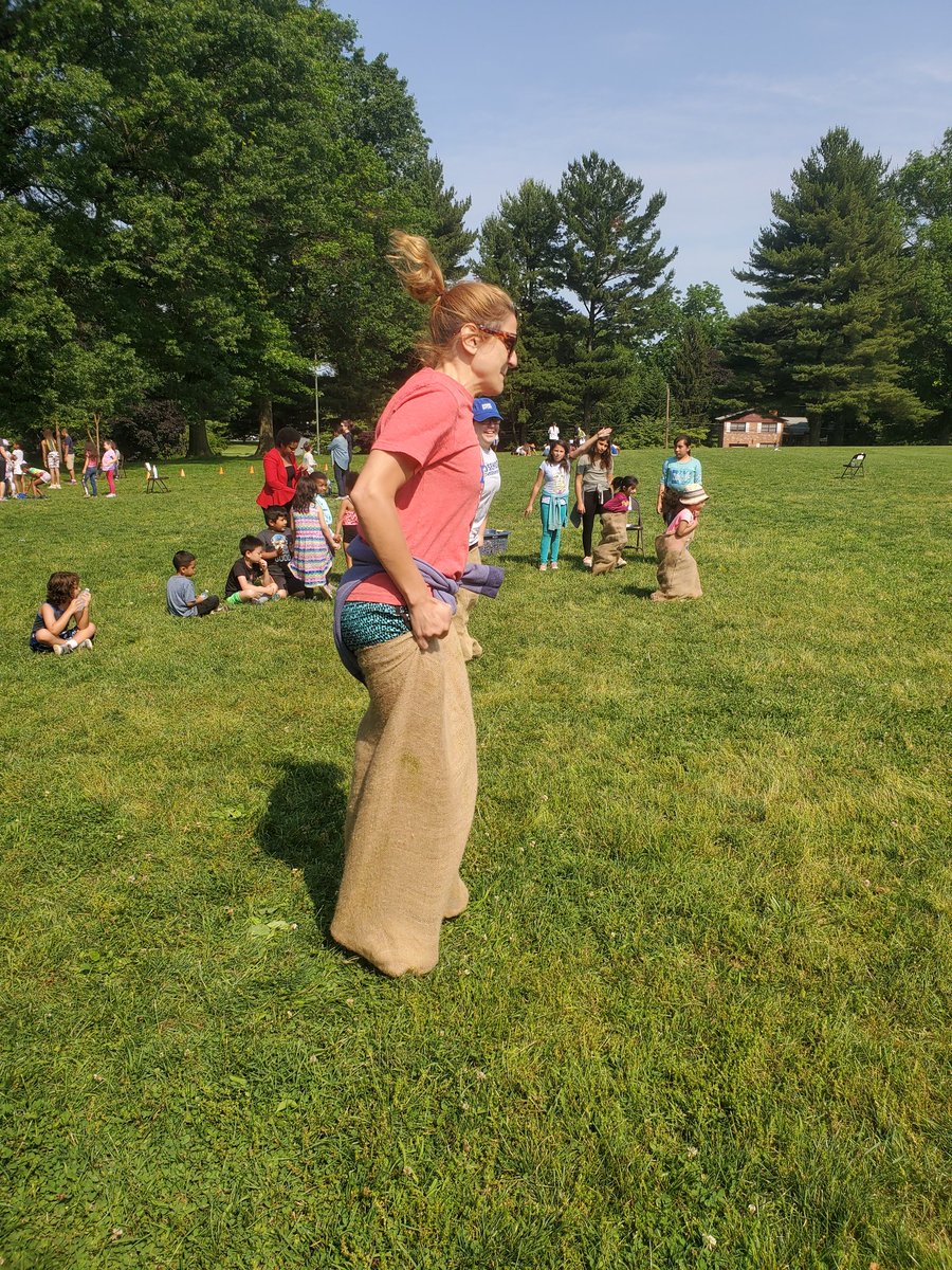 idaredmc's tweet photo. Rosemont teachers hopping in the #potatosackrace give the students some real competition and fun. #FieldDay fun!! @RosemontElem @AP_RosemontElem @angelalynn1982 @MCPS https://t.co/SfBR7oB44k