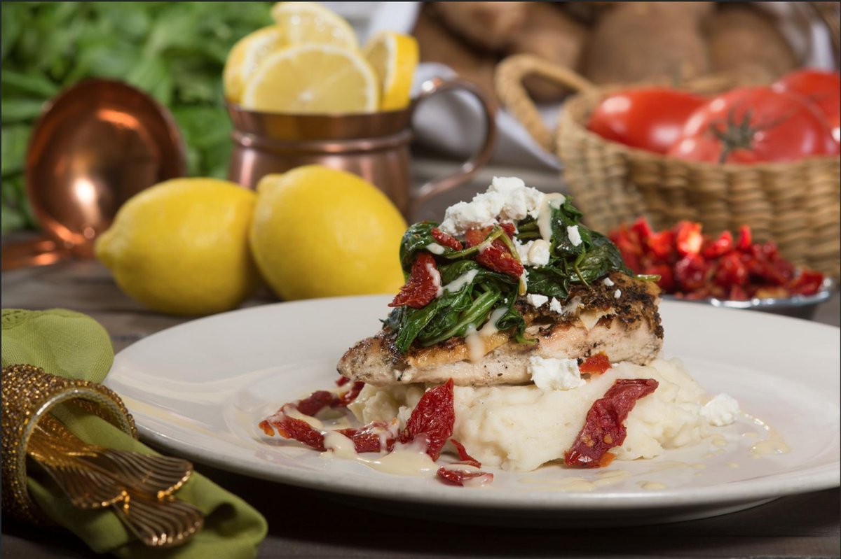 The Vista Chicken is a low country classic that is served complete with sautéed spinach, sun-dried tomatoes, goat cheese, and a fire roasted chicken breast on top of mashed potatoes. With a drizzle of roasted garlic butter on top, this dish will have your mouth running!